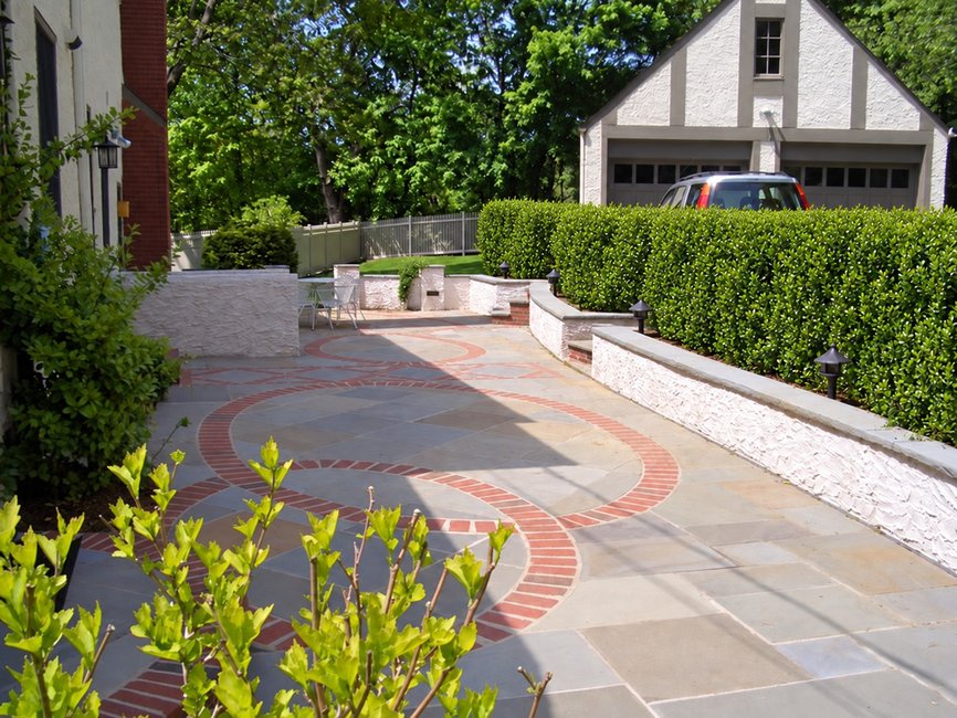 driveway renovation with boxwood hedge after